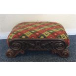 A Regency mahogany upholstered top stool with scro