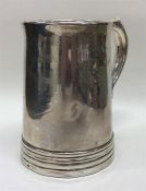 A Chinese silver pint mug of tapering form with gl