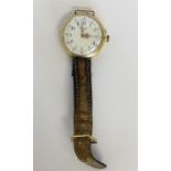 A lady's 18 carat wristwatch with white enamelled