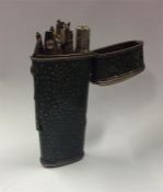 A shagreen and silver etui with fitted interior an