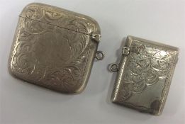 A good silver scroll decorated vesta with hinged t