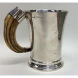 A good silver tapering mug with horn handle. Birmi