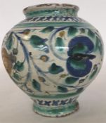 A Maiolica oviform jar brightly painted in ochre, g