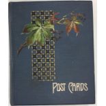 An old postcard album complete with numerous postc