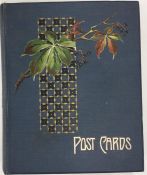 An old postcard album complete with numerous postc