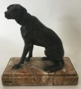 A good quality bronzed figure of a dog in seated p