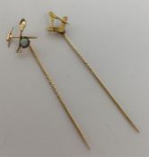 A Masonic stick pin together with an opal mining s