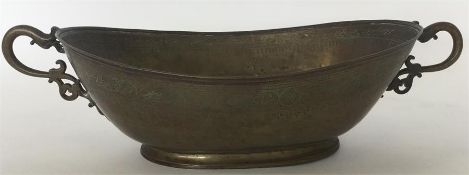A Persian oval engraved two-handled basket. Approx