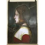 An unusual Antique stained glass panel of a lady i