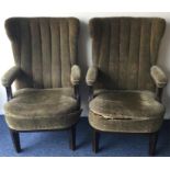 A pair of unusual railway carriage armchairs with