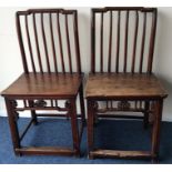 A pair of late 19th Century ironwork chairs with s