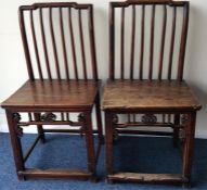 A pair of late 19th Century ironwork chairs with s