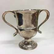A Georgian silver trophy cup with reeded sides. Ma