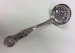 A Kings' pattern sifter spoon of typical design. L