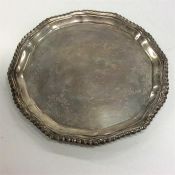 A small pie-crust waiter with gadroon rim. Birming