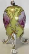 A 19th Century Meissen porcelain yellow ground egg