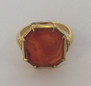 A high carat signet ring mounted with cornelian in
