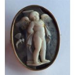 An oval cameo of a winged infant. Approx. 9.4 gram