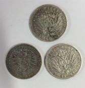 Three German silver Marks. Est. £25 - £35.