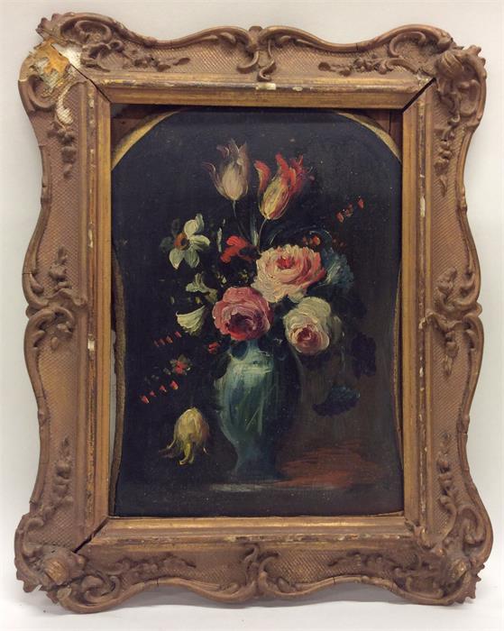 A still life of a vase of flowers in gilt frame. O