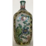 A Japanese Kutani porcelain bottle decorated with