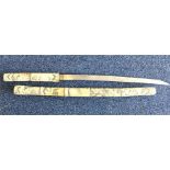 A large Antique carved ivory sword, the body decor