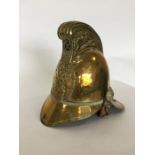 A heavy brass Merryweather Fireman's helmet. Est.