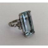 A large platinum-mounted single stone aquamarine r