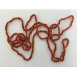 A good Georgian string of coral beads with carved