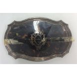 A silver and tortoiseshell dressing table tray wit