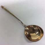 A good quality Russian silver gilt spoon with twis