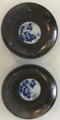 A pair of Japanese porcelain blue, white and dark
