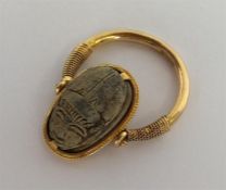 A good Antique gold ring mounted with scarab and h