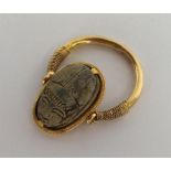 A good Antique gold ring mounted with scarab and h