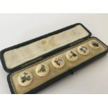 A boxed set of six Japanese Shibayama buttons deco