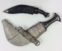A Jambiya knife and sheath together with one other