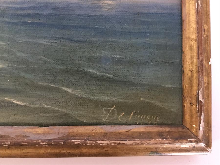 A gilt framed oil painting of a ship on coastal wa - Bild 3 aus 4