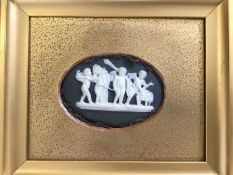 A Wedgwood black Jasper oval plaque finely modelle