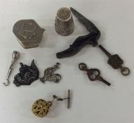 A bag containing silver thimbles, boxes, fobs etc.