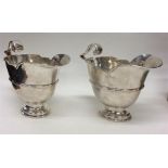 A pair of silver Georgian-style sauce boats with c