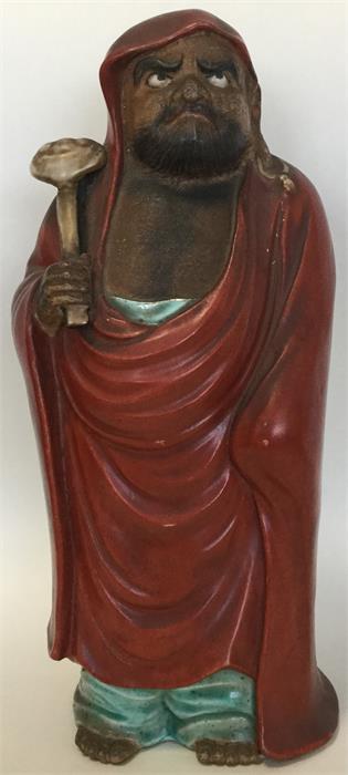 A Japanese Kutani porcelain figure finely modelled