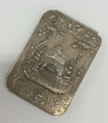 A Chinese silver hinged top card case with foliate