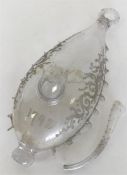An Antique glass cistern with wriggle work decorat
