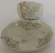 An 18th Century Bow tea bowl and saucer moulded wi