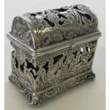 An attractive silver dome top casket with pierced