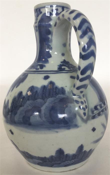 A Japanese porcelain blue and white oviform jug, t - Image 2 of 3