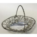 A Georgian silver turned swing-handled basket attr