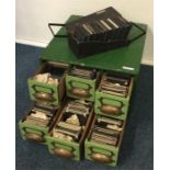 A chest containing numerous slides. Est. £40 - £60