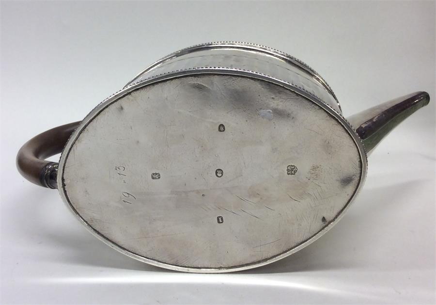 A good Georgian silver teapot with half fluted bod - Image 3 of 3