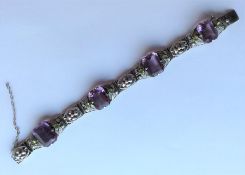 SUFFRAGETTE: A silver-mounted stylish bracelet wit